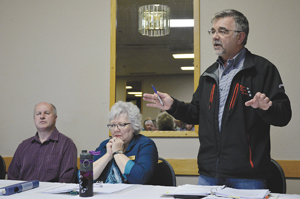 (Photo By Trevor Busch) FIERY DEBATE
