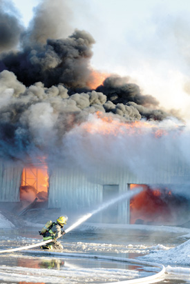 (Photo by Greg Price) FIRE FIGHT